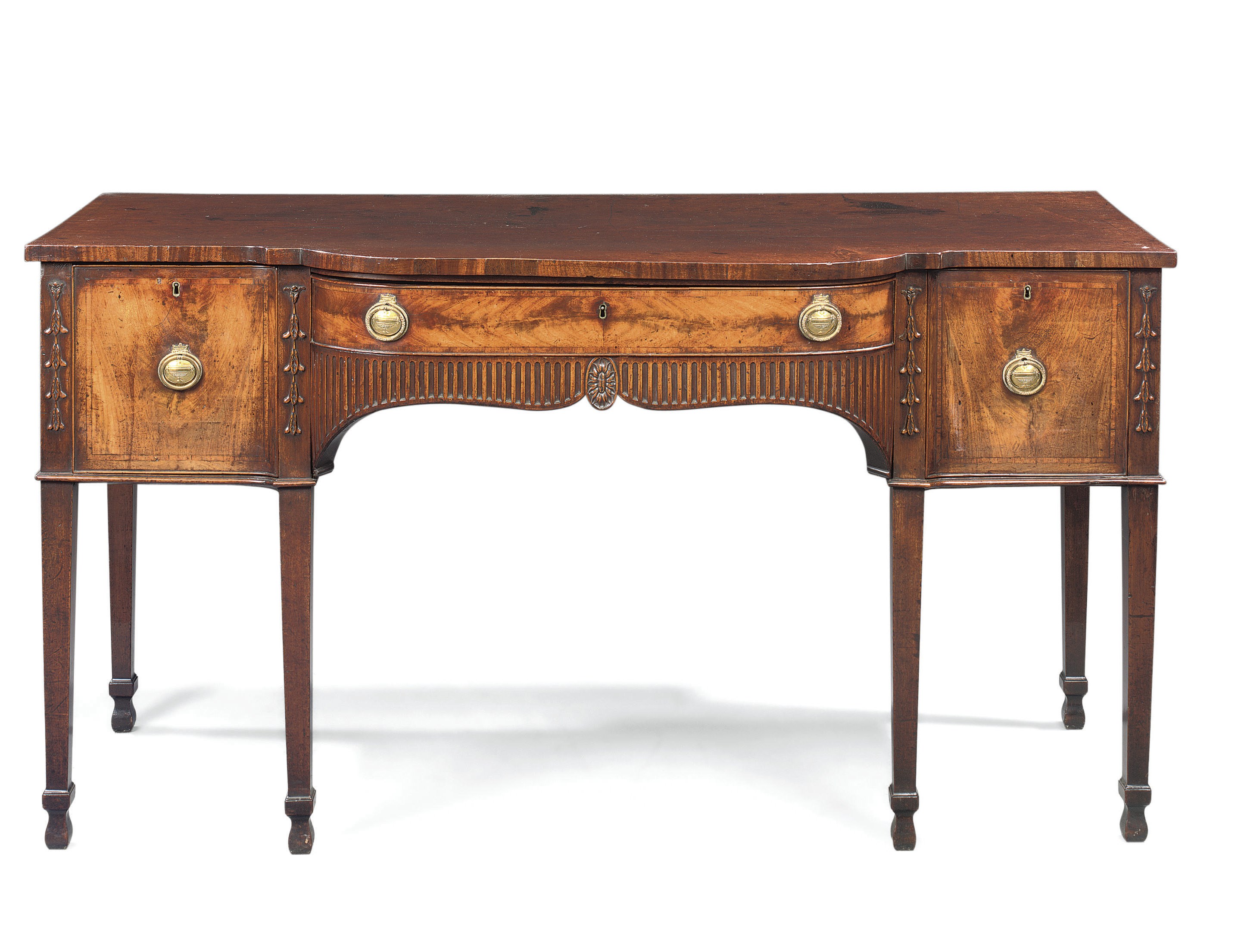 A GEORGE III MAHOGANY AND PLUM-PUDDING MAHOGANY BREAKFRONT SIDEBOARD