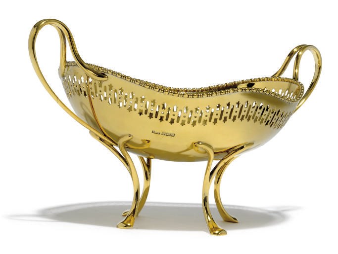 AN EDWARDIAN SILVER-GILT FRUIT BOWL