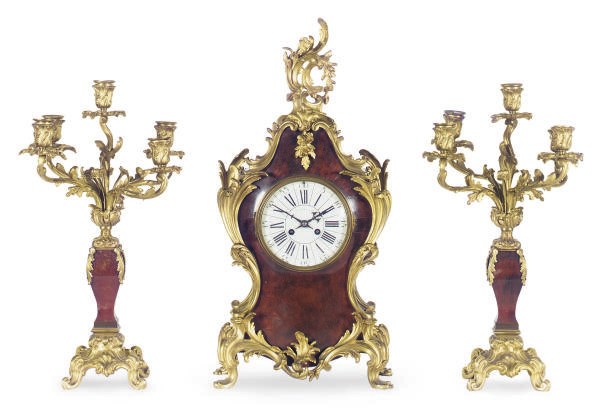 A GILT-BRONZE MOUNTED TORTOISESHELL CLOCK GARNITURE,