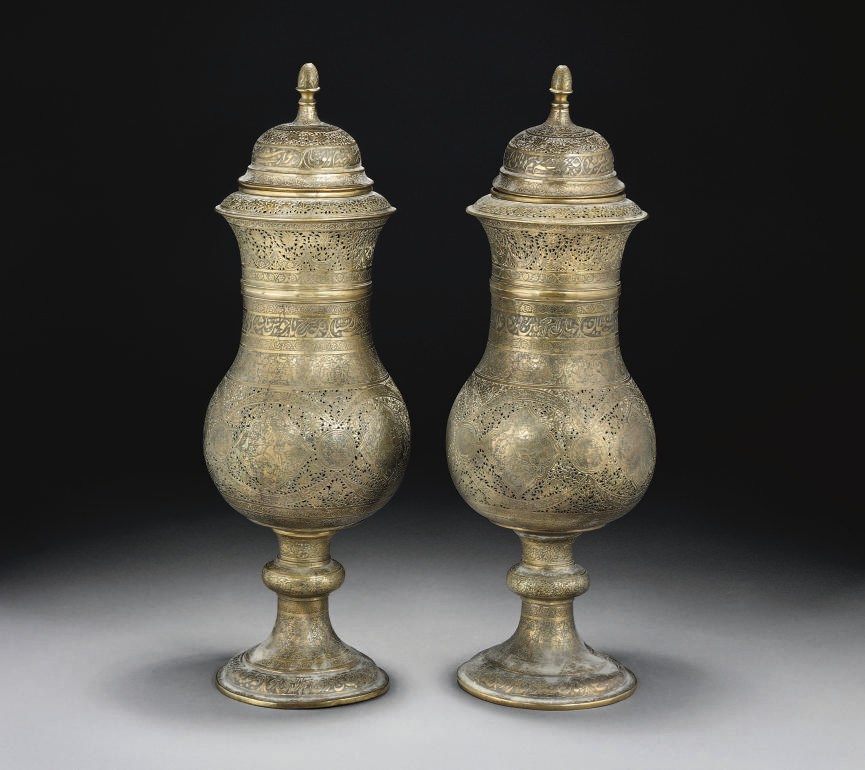 A PAIR OF QAJAR PIERCED BRASS VASES, IRAN, 19TH CENTURY