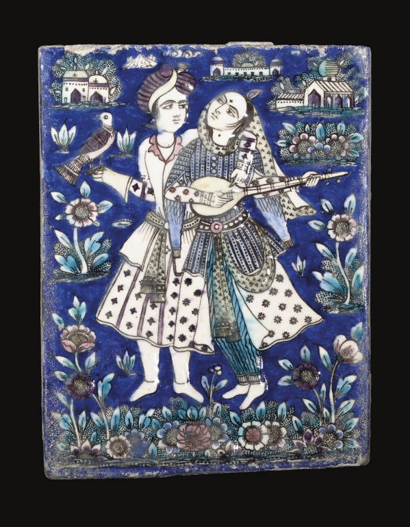 TWO QAJAR MOULDED POTTERY TILES, IRAN, 19TH CENTURY
