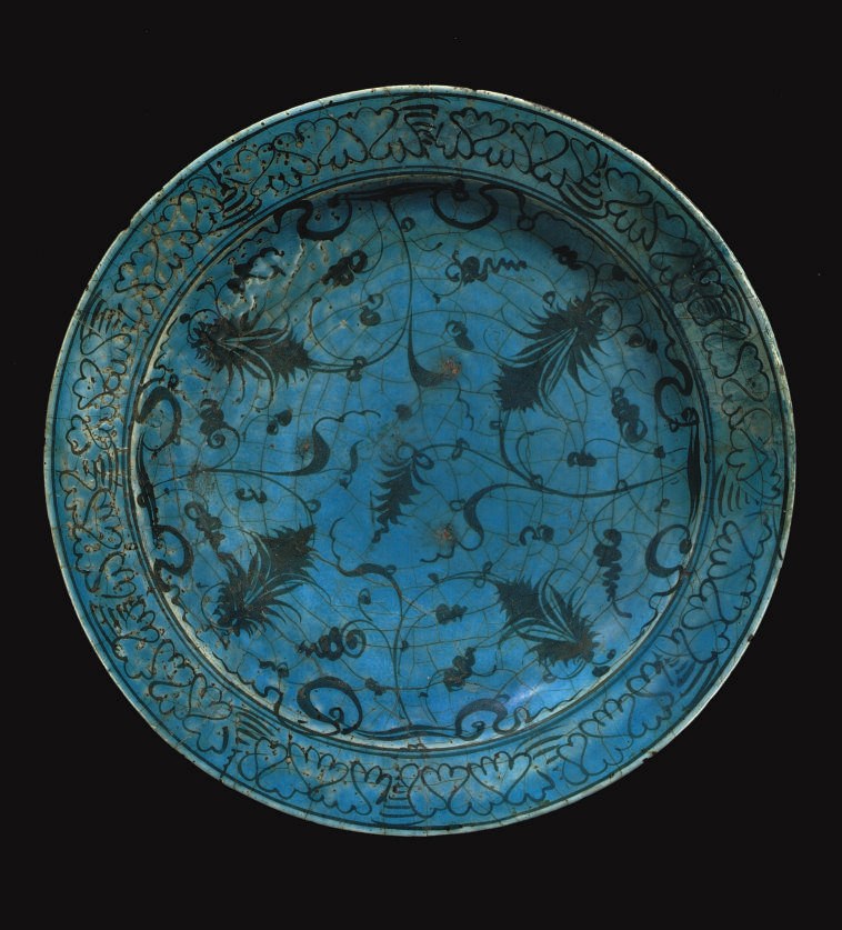 A LARGE TURQUOISE AND BLACK KUBACHI BOWL, IRAN, 17TH CENTURY