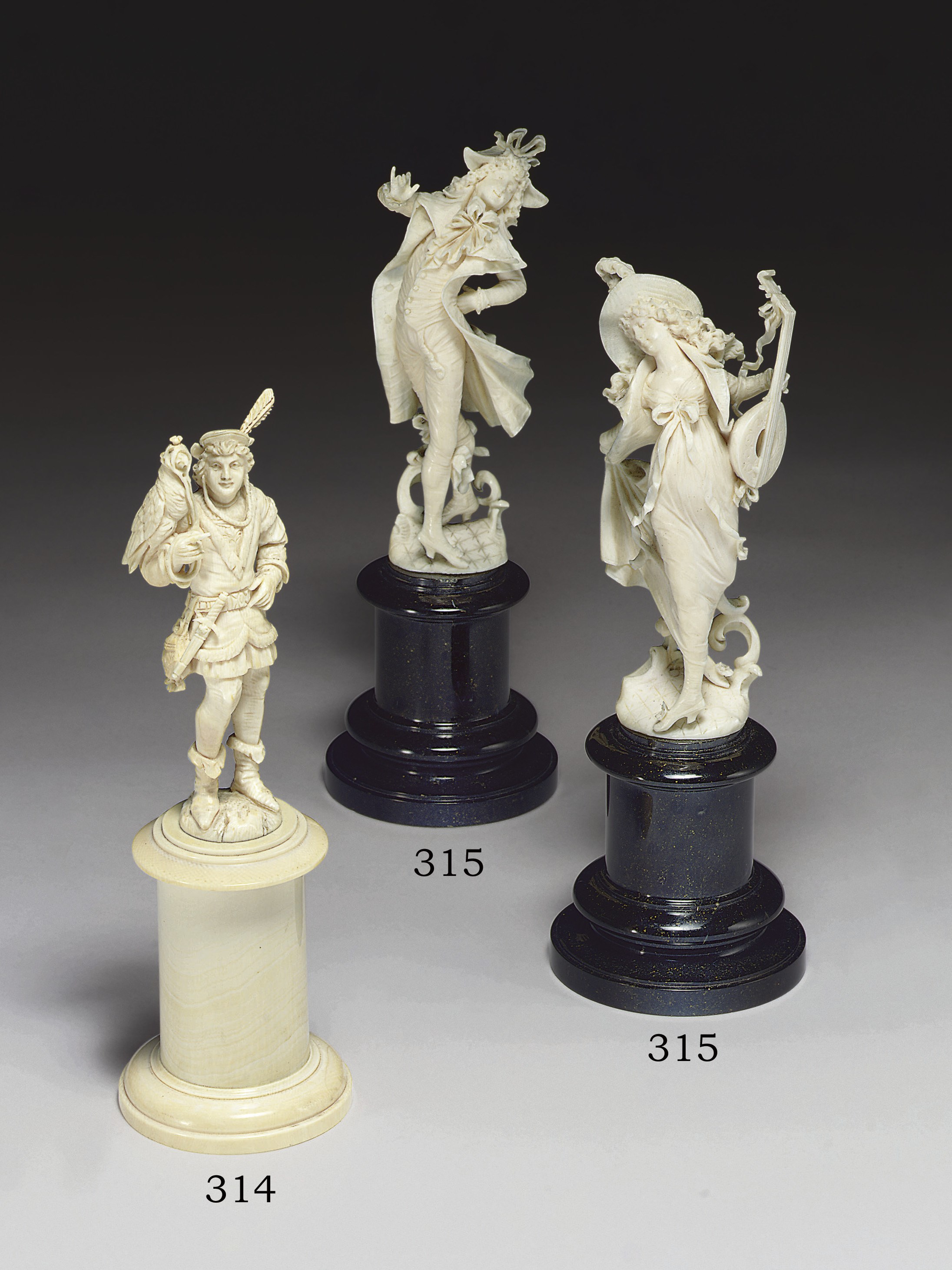 A CONTINENTAL IVORY FIGURE OF A FALCONER**
