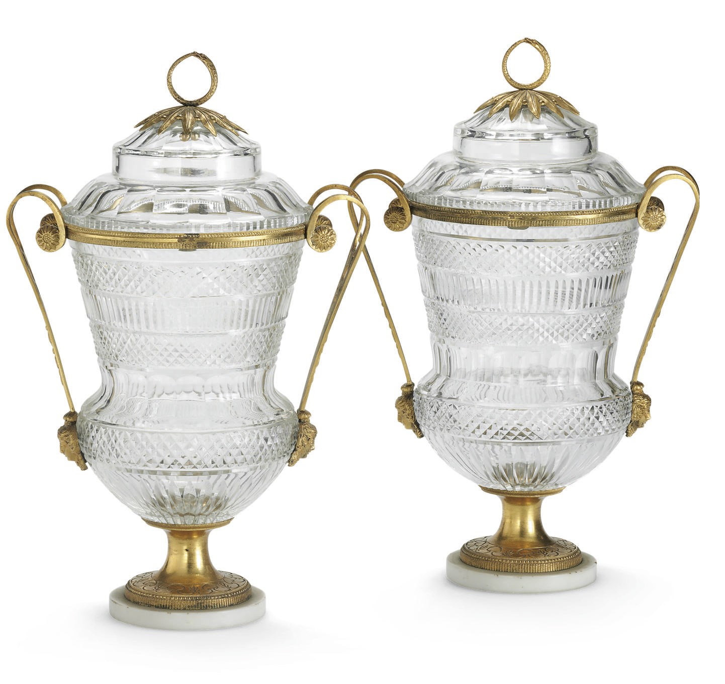 A PAIR OF CONTINENTAL ORMOLU AND CUT-GLASS VASES AND COVERS
