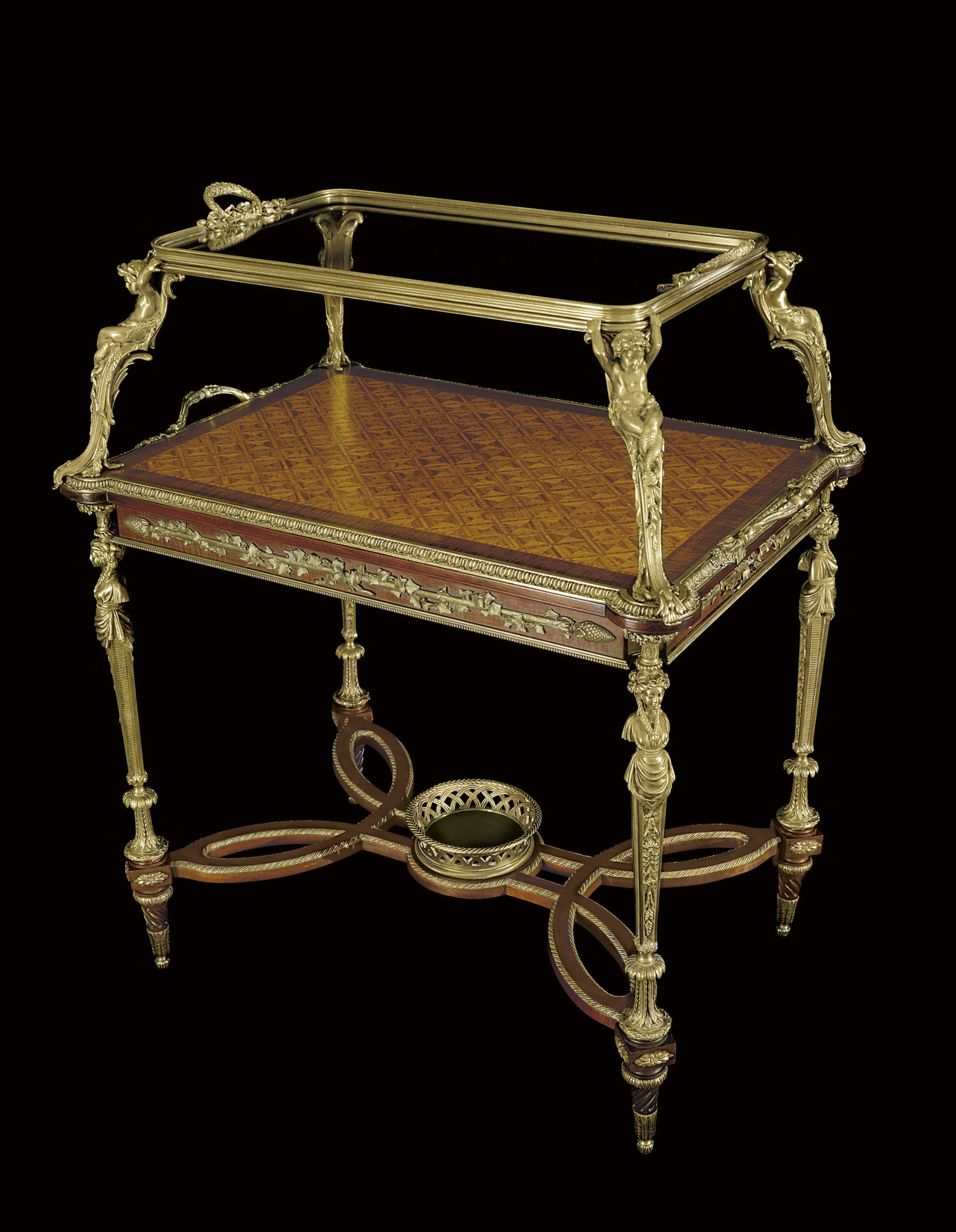 A FRENCH ORMOLU-MOUNTED MAHOGANY, TULIPWOOD AND PARQUETRY TEA-TABLE