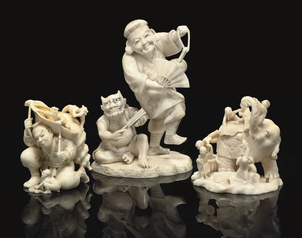 A group of three ivory okimono, Meiji Period (1868-1912)