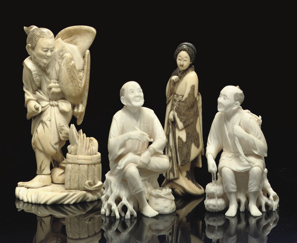 A group of four ivory okimono, Meiji Period (1868-1912)