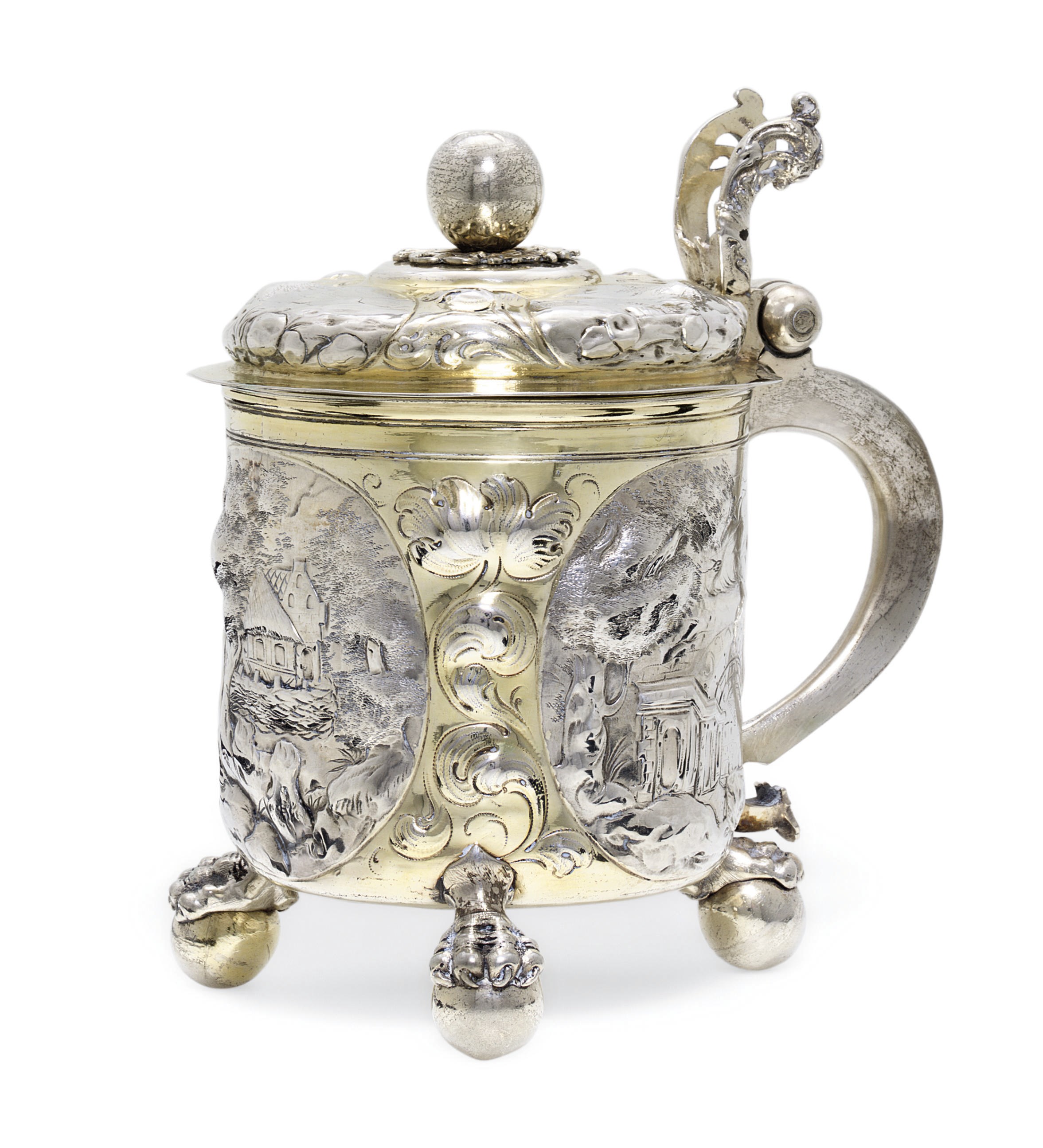 A GERMAN PARCEL-GILT SILVER TANKARD
