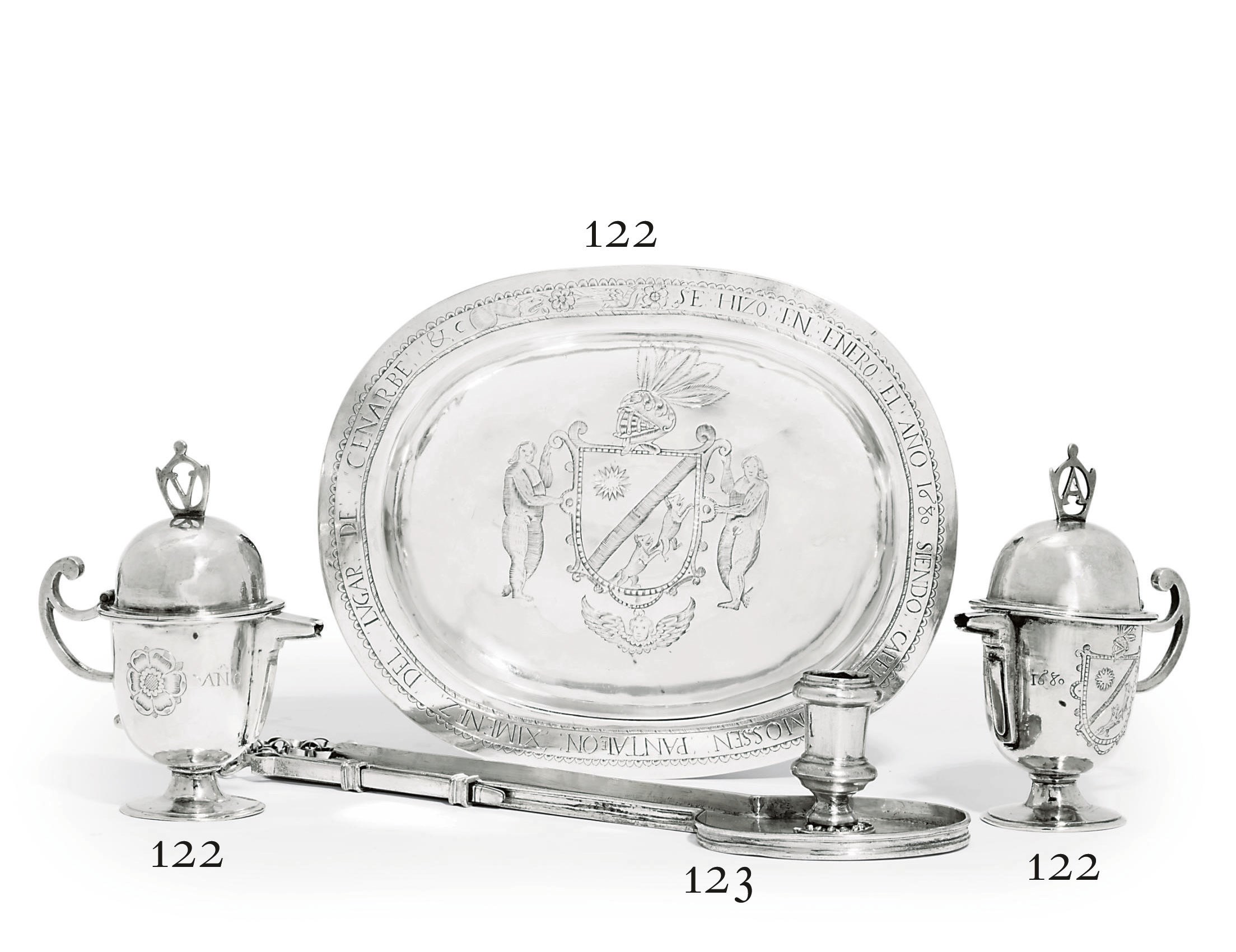 A SPANISH SILVER ALTAR CRUET