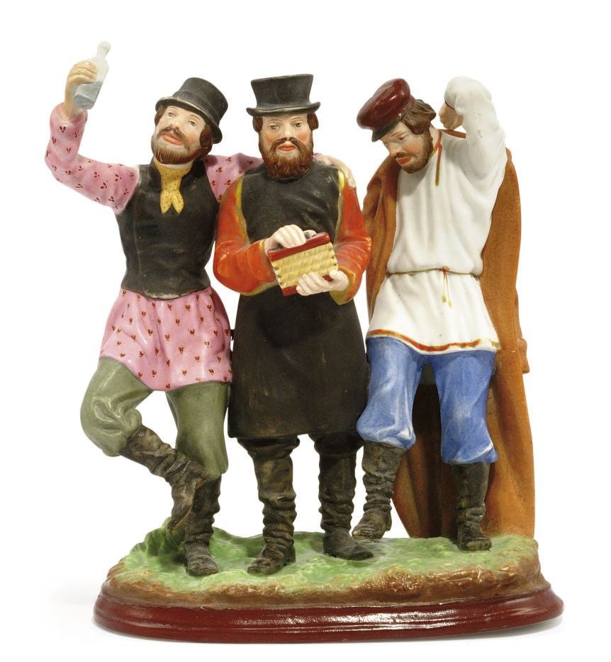 A BISCUIT PORCELAIN FIGURE GROUP