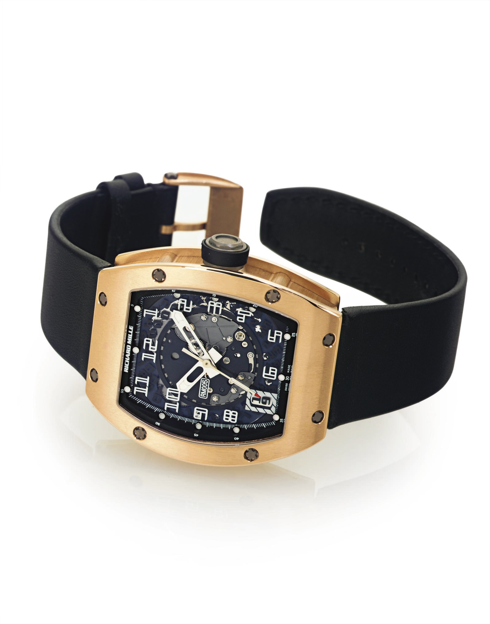 RICHARD MILLE. A FINE AND LARGE 18K PINK GOLD SKELETONIZED AUTOMATIC WRISTWATCH WITH DATE AND CENTER SECONDS
