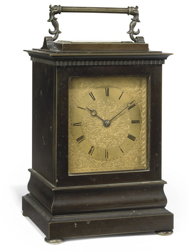 A VICTORIAN PATINATED-BRONZE STRIKING CARRIAGE CLOCK