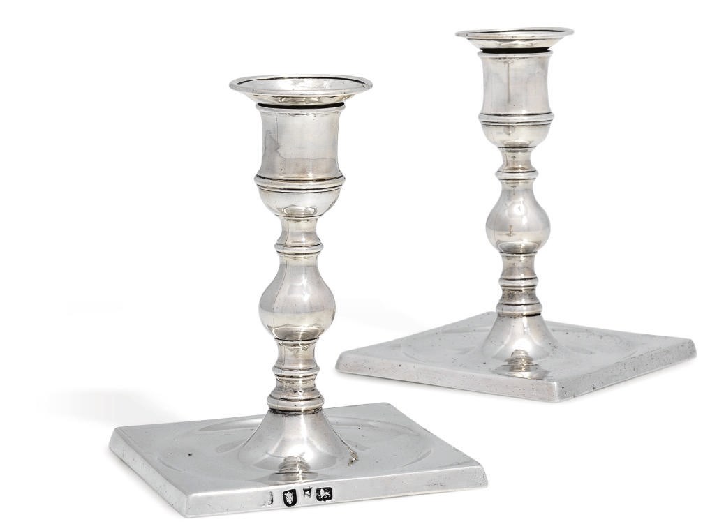 A PAIR OF GEORGE III SILVER CANDLESTICKS