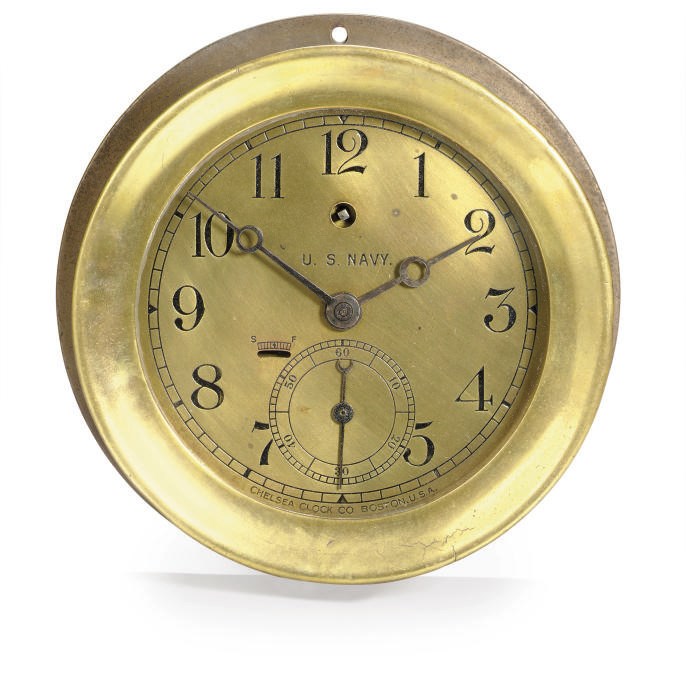 A U.S. Navy bulkhead clock