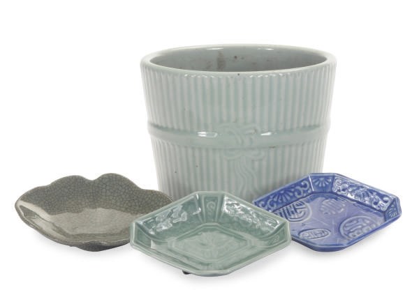A PAIR OF CELADON GLAZED FLOWER POTS AND THREE SETS OF SMALL DISHES,