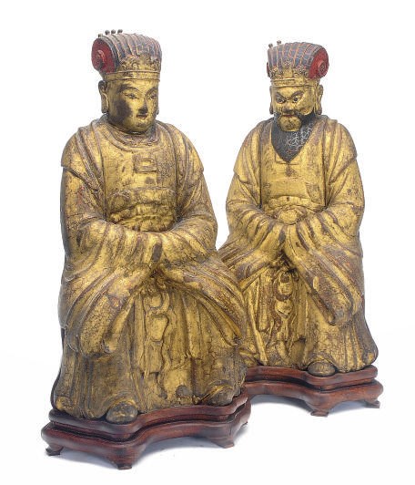 A PAIR OF CHINESE GILTWOOD FIGURES OF SEATED IMMORTALS,