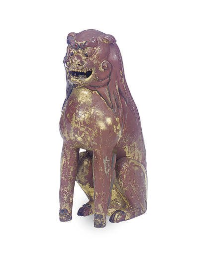 A JAPANESE GILT LACQUERED FIGURE OF A SEATED SHI SHI,