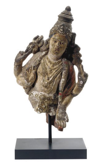 AN INDIAN POTTERY POLYCHROME-PAINTED FIGURE OF A DEITY,