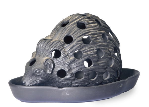 AN ENGLISH BASALT CROCUS POT IN THE FORM OF A HEDGEHOG AND UNDERPLATE,