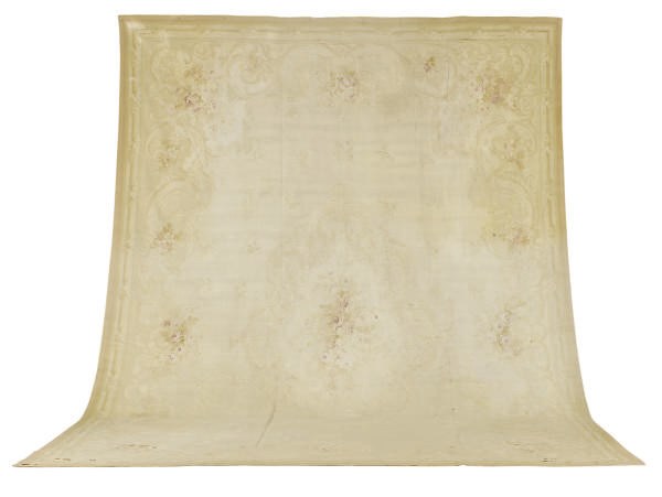 AN AUBUSSON CARPET,