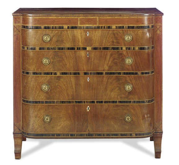 A REGENCY MAHOGANY AND CALAMANDER-BANDED CHEST-OF-DRAWERS**,