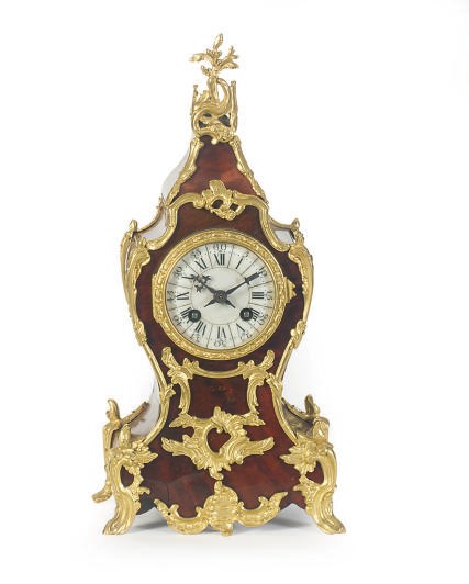A FRENCH GILT-BRONZE MOUNTED TORTOISESHELL MANTELCLOCK**,