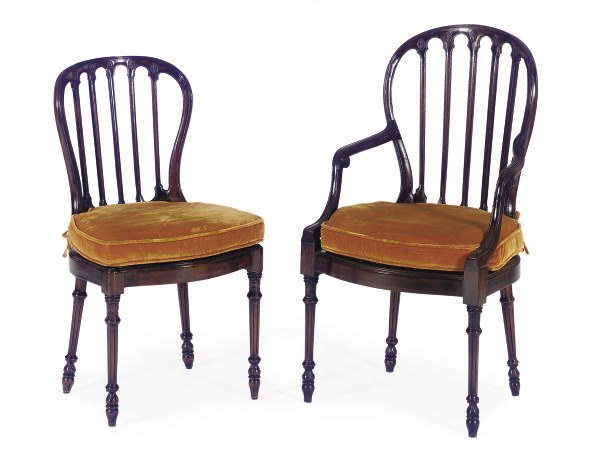 A SET OF TWELVE FRENCH MAHOGANY AND CANED DINING CHAIRS,