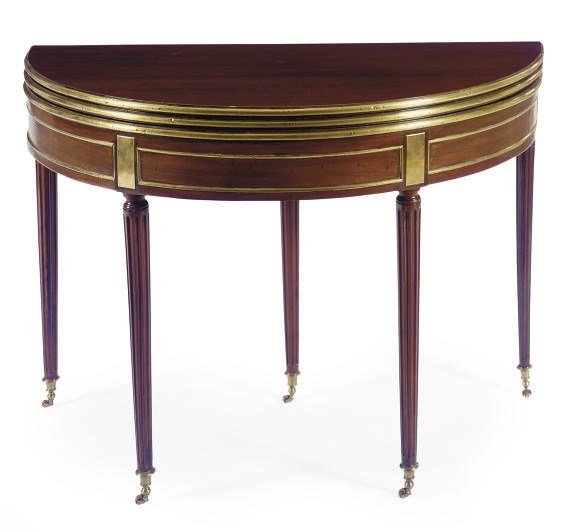 A LOUIS XV GILT-METAL MOUNTED MAHOGANY DOUBLE FOLD-OVER GAMES-TABLE,