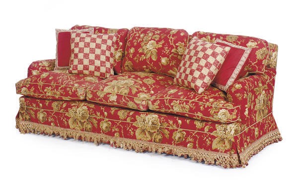 A THREE-SEAT RED AND BEIGE FLORAL PRINT COTTON SOFA,
