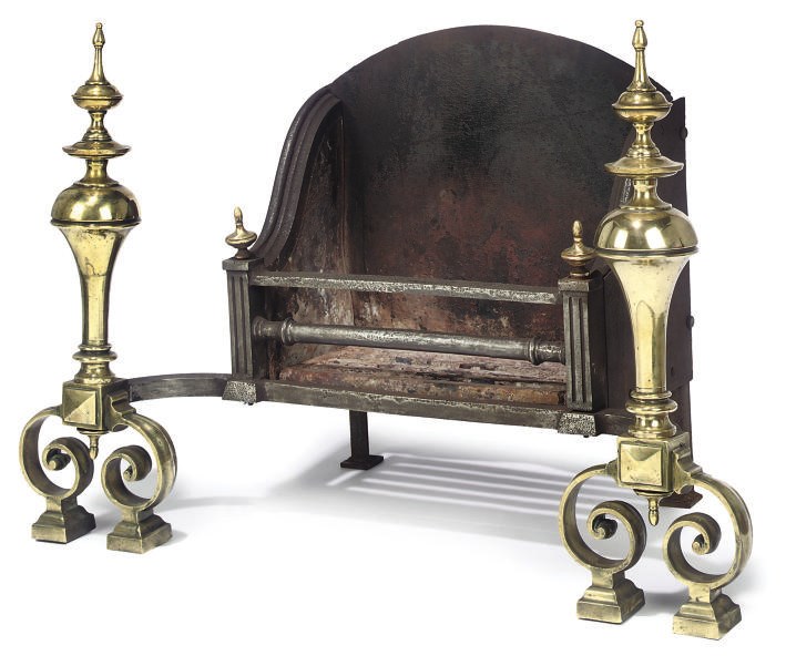 A VICTORIAN BRASS AND IRON FIREGRATE