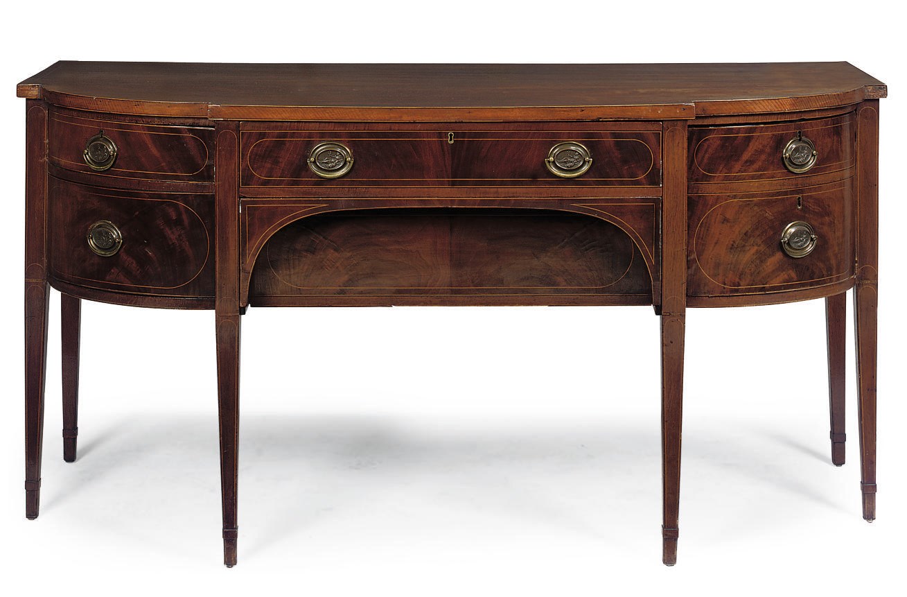 A LATE REGENCY MAHOGANY BOXWOOD LINE INLAID BREAKFRONT SIDEBOARD