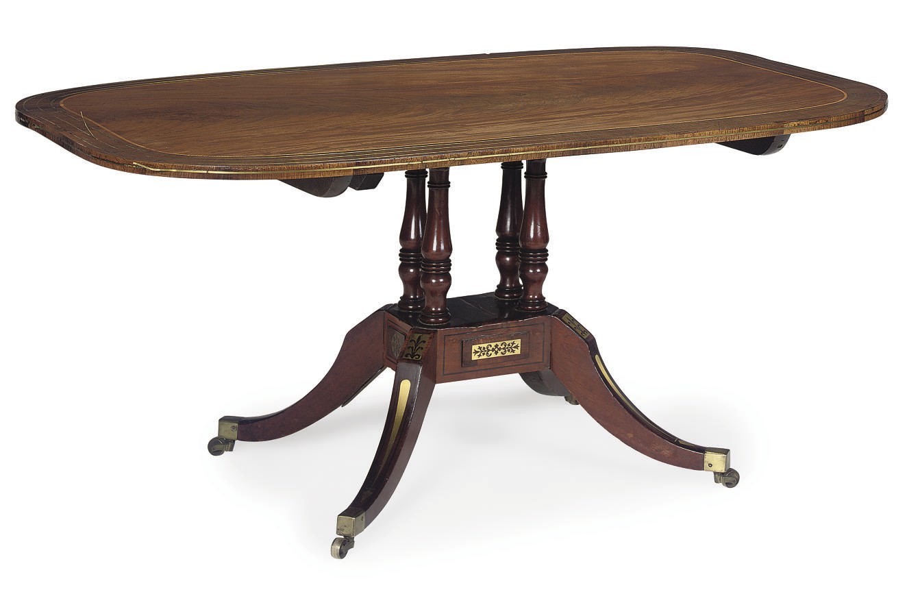 A REGENCY BRASS INLAID MAHOGANY AND ROSEWOOD CROSSBANDED BREAKFAST TABLE
