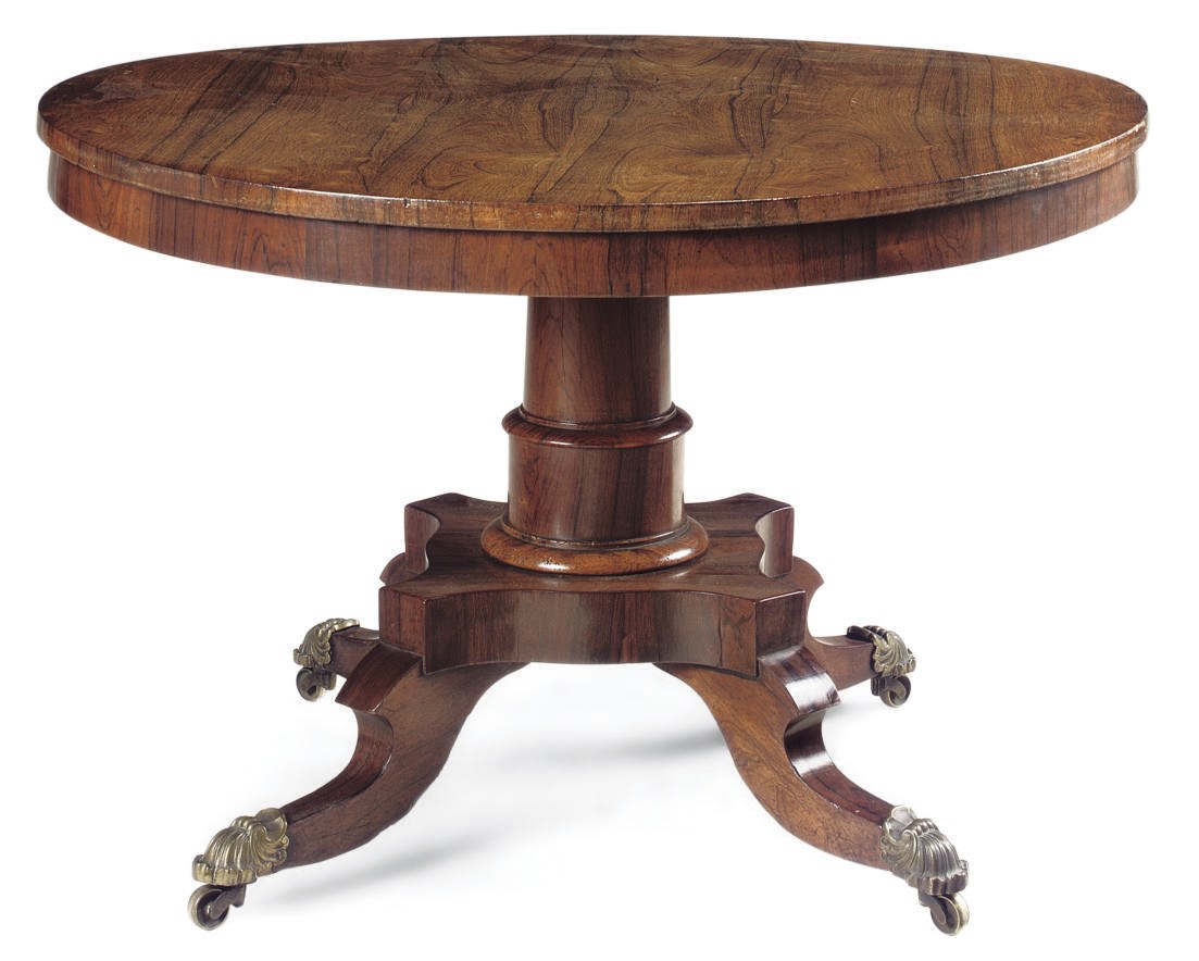 A REGENCY ROSEWOOD BREAKFAST TABLE