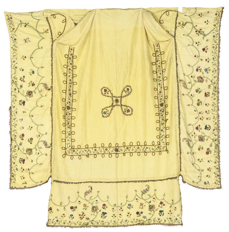 A LARGE PANEL OF LEMON-YELLOW SILK, PROBABLY DRESS ROBINGS