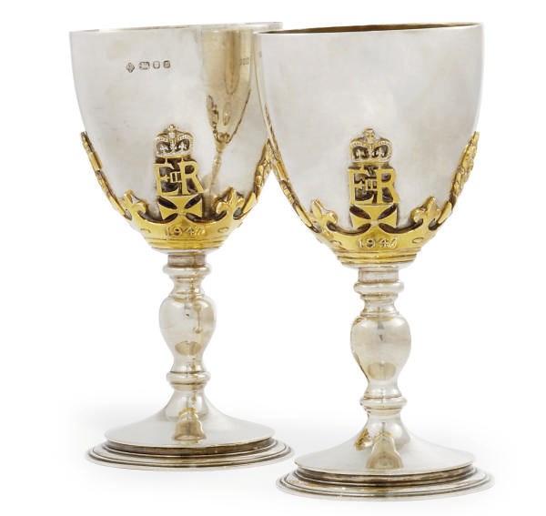 A PAIR OF MODERN SILVER GOBLETS COMMEMORATING THE SILVER WEDDING ANNIVERSARY OF H.M. THE QUEEN AND THE DUKE OF EDINBURGH
