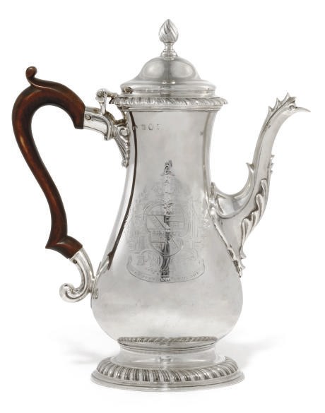 A GEORGE III SILVER COFFEE POT