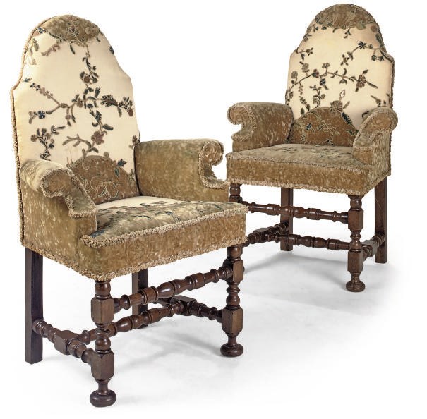 A PAIR OF FRENCH OAK AND UPHOLSTERED ARMCAIRS