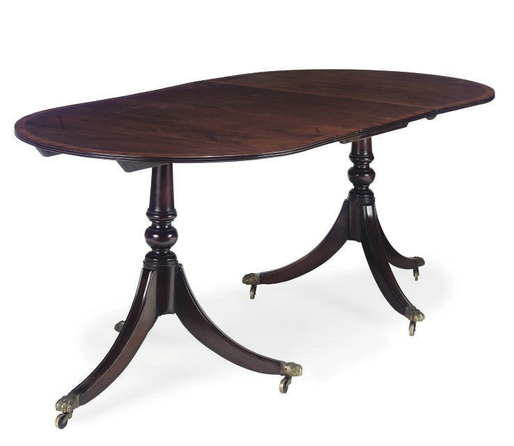 A MAHOGANY TWIN PEDESTAL DINING TABLE