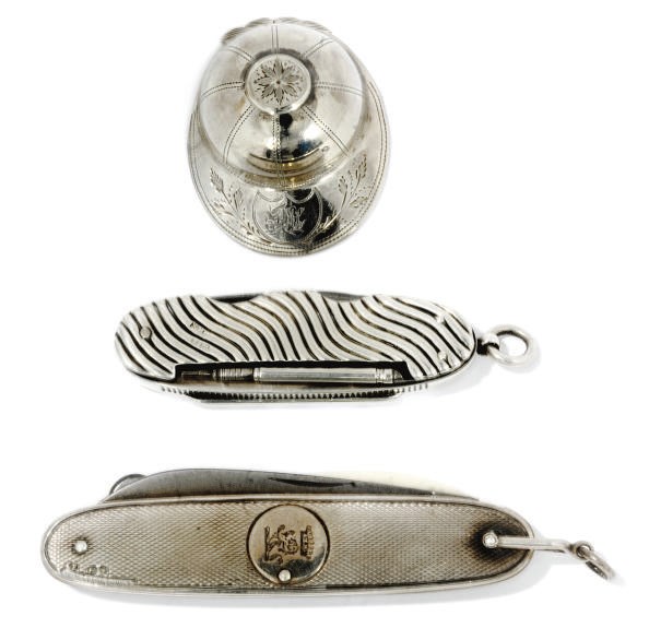 A GEORGE III SILVER JOCKEY CAP CADDY SPOON