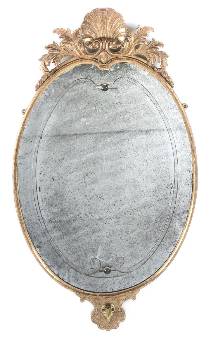A GILT-GESSO MIRROR