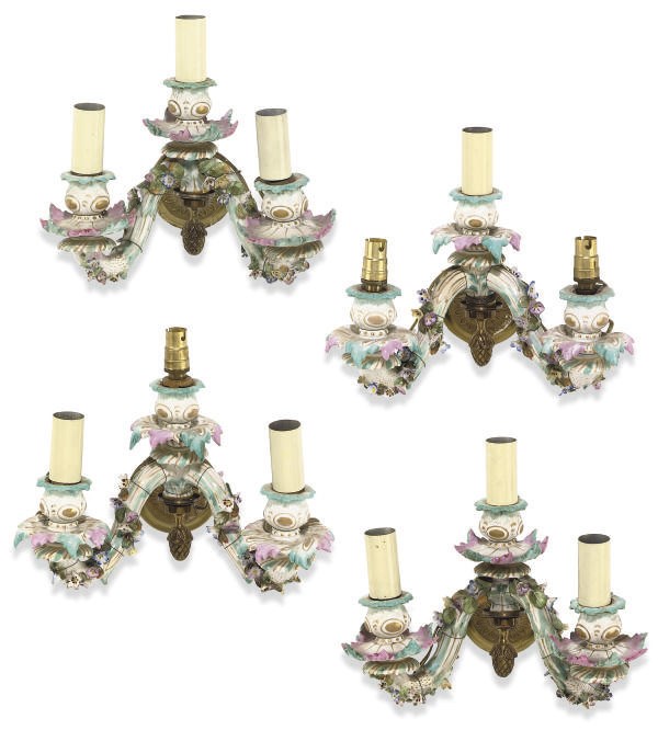 FOUR GERMAN PORCELAIN THREE-LIGHT WALL LIGHTS