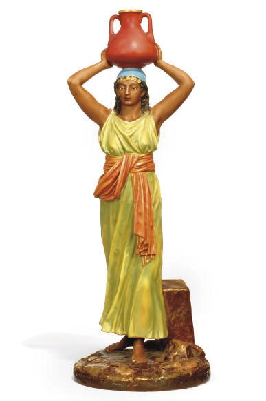 A ROYAL WORCESTER FIGURE OF A FEMALE MOORISH SLAVE