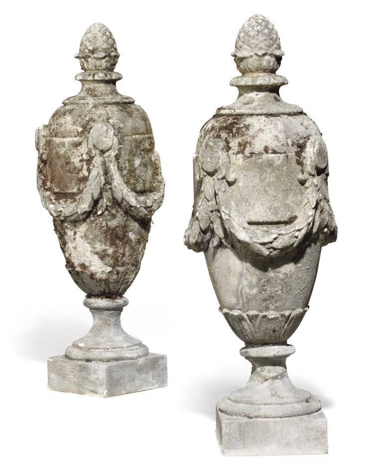 A PAIR OF FRENCH STONE GATE PIER FINIALS