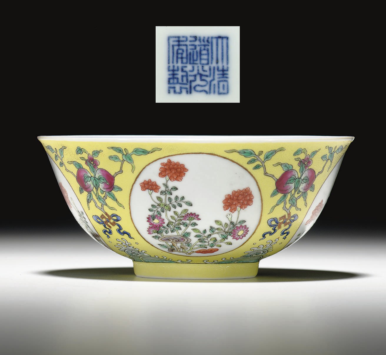 A FAMILLE ROSE SGRAFFIATO YELLOW-GROUND MEDALLION BOWL
