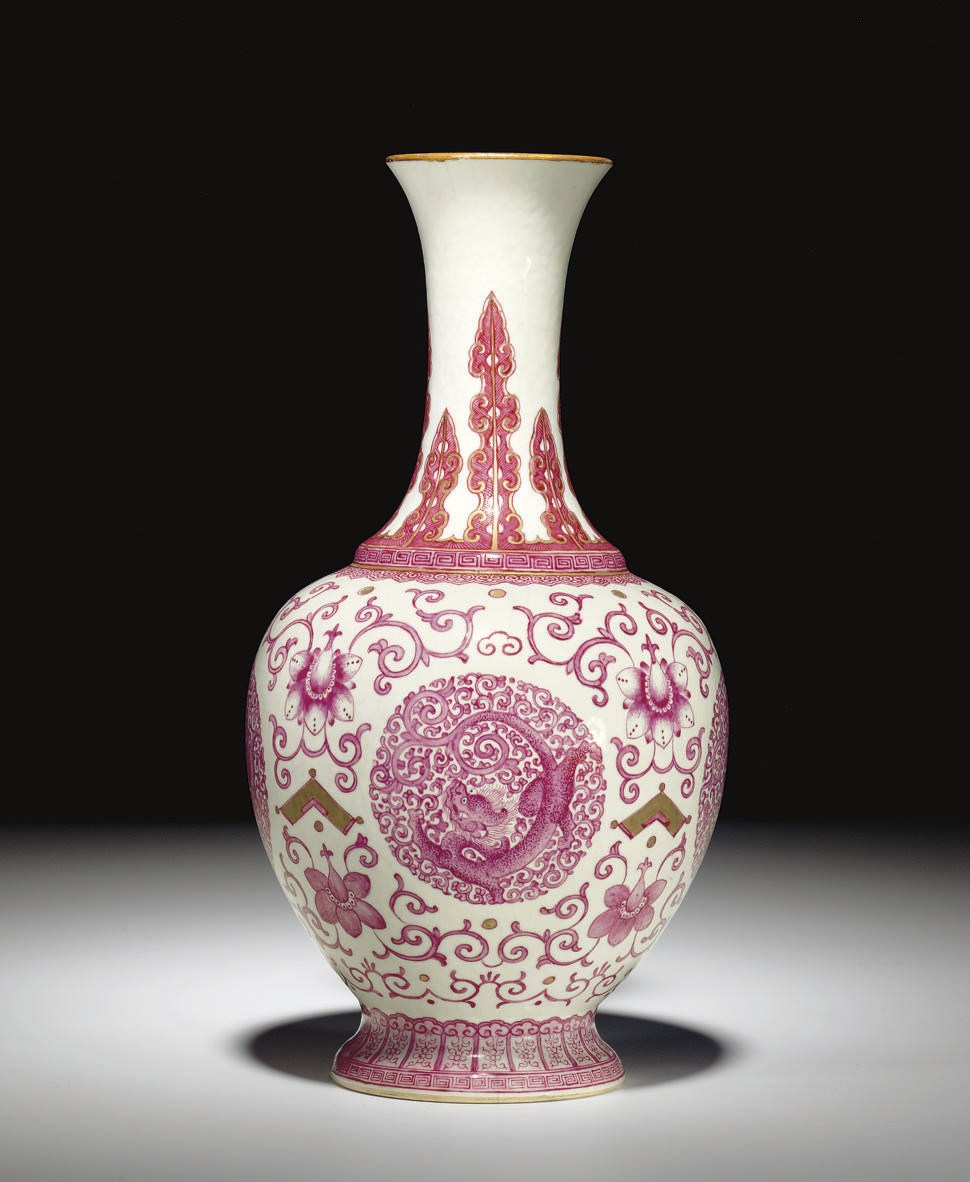 AN UNUSUAL PUCE AND GILT-DECORATED VASE