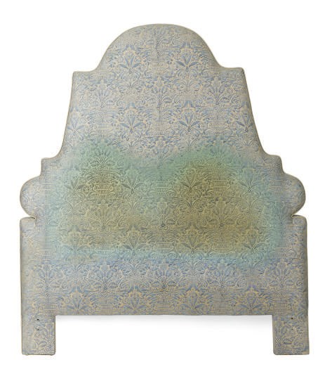 A FORTUNY UPHOLSTERED HEABOARD,