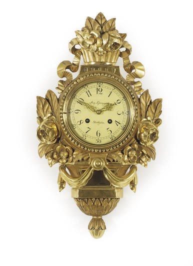 A SWEDISH GILTWOOD CARTEL CLOCK,