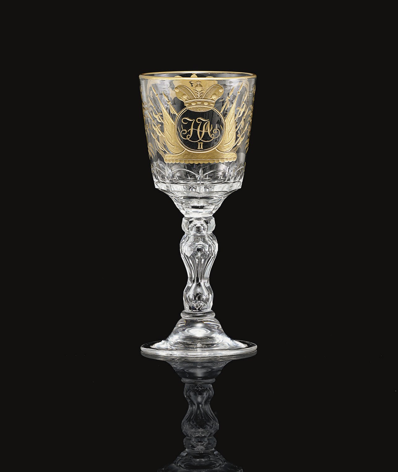 A Cut and Engraved Glass Wine Goblet
