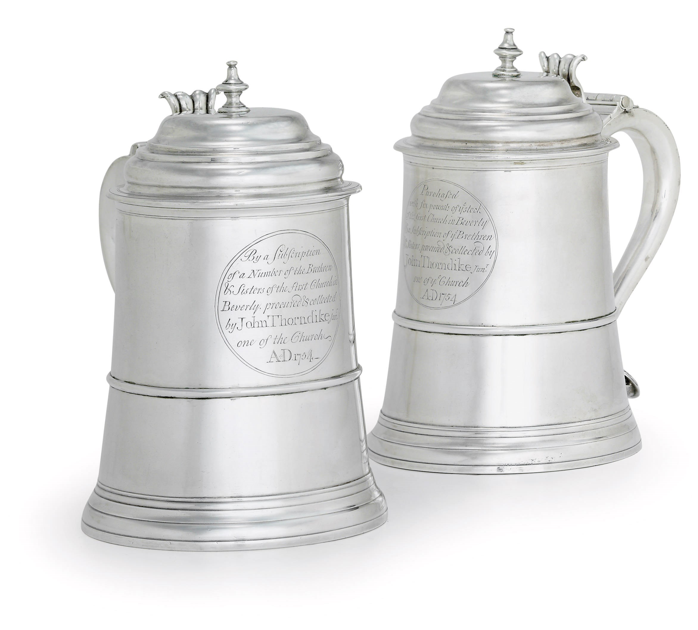 A PAIR OF SILVER TANKARDS