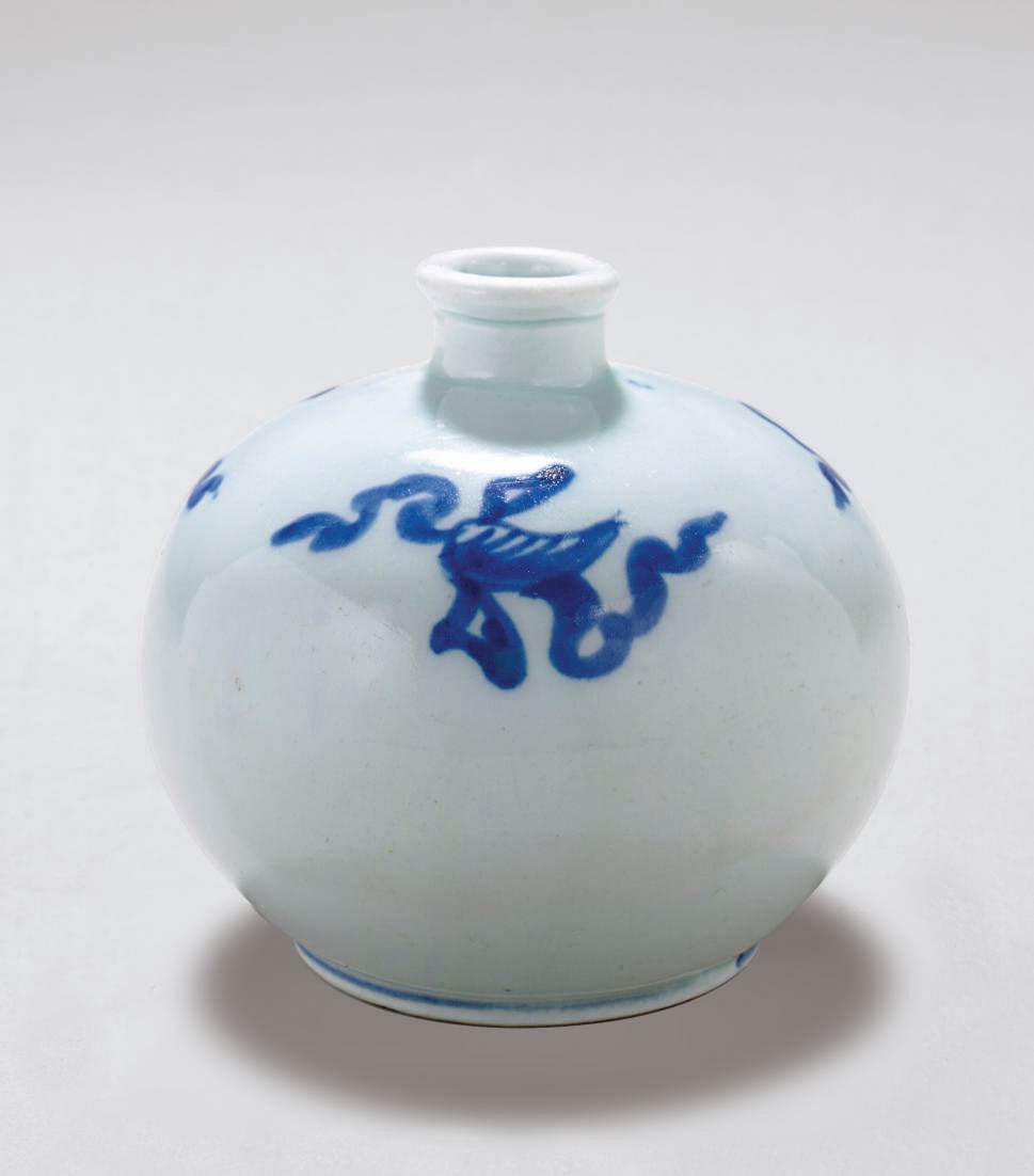 A Small Blue and White Bottle